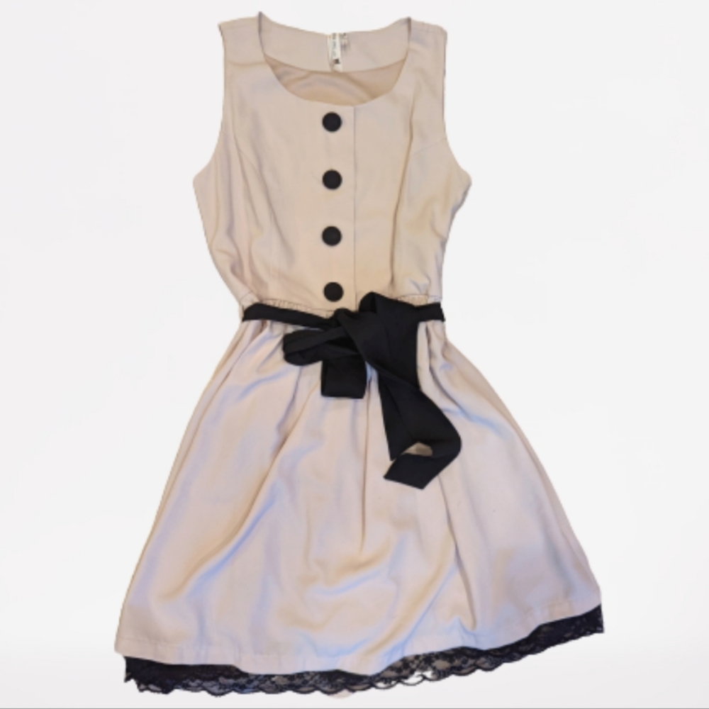 Pink Owl Dress. Cream color with black tie belt, size small.